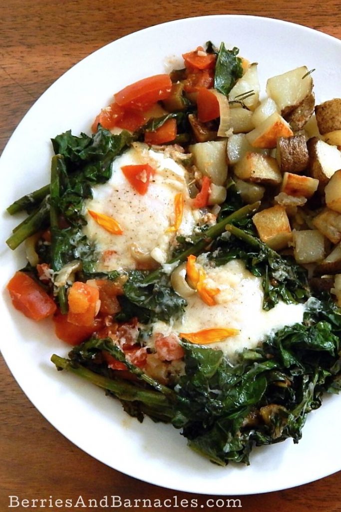 Calendula baked eggs with spring greens, cumin and smoked paprika