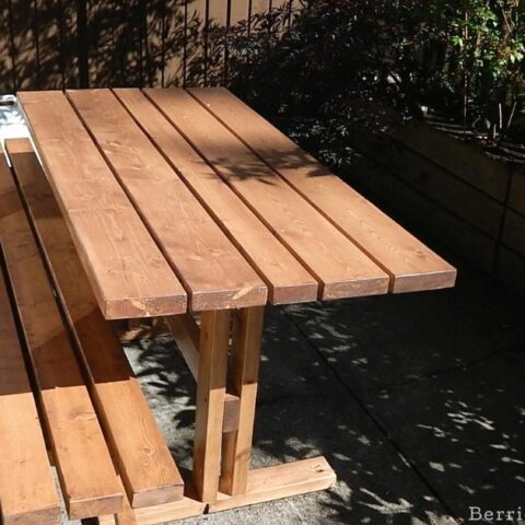 A simple plan for a balcony, deck or patio-sized picnic table. Long and narrow with trestle legs.